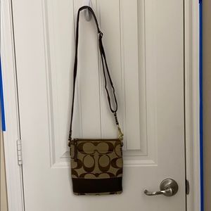 Coach Brown Swingpack in good condition.